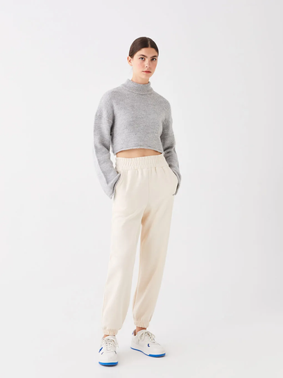 Knit crop + jogger set made from RyderTex knitted fabric, product cutout on a neutral background.