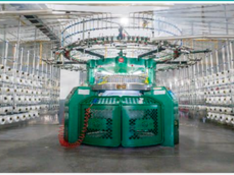 Circular knitting machine on the RyderTex floor, frame 1 of four.