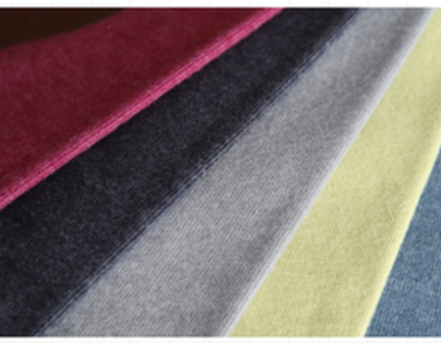 Fan of velour swatches with visible pile in magenta, charcoal and citron.